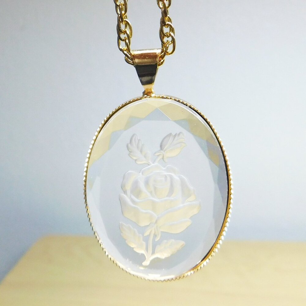 Clear Rose Etched Pendent on a Gold Tone Chain
